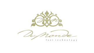 Логотип «Du Monde»